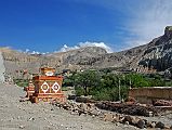Mustang 02 06-1 Tetang Entrance Chorten Tetang (2940m) is set between two hills to avoid much of the Kali Gandaki wind. Here is the entrance chorten to Tetang, with the main village further up the valley. Overall I did not enjoy trekking the east side of the Kali Gandaki Valley. I recommend going back the western side and simply trekking from Chuksang for half an hour to Tetang.